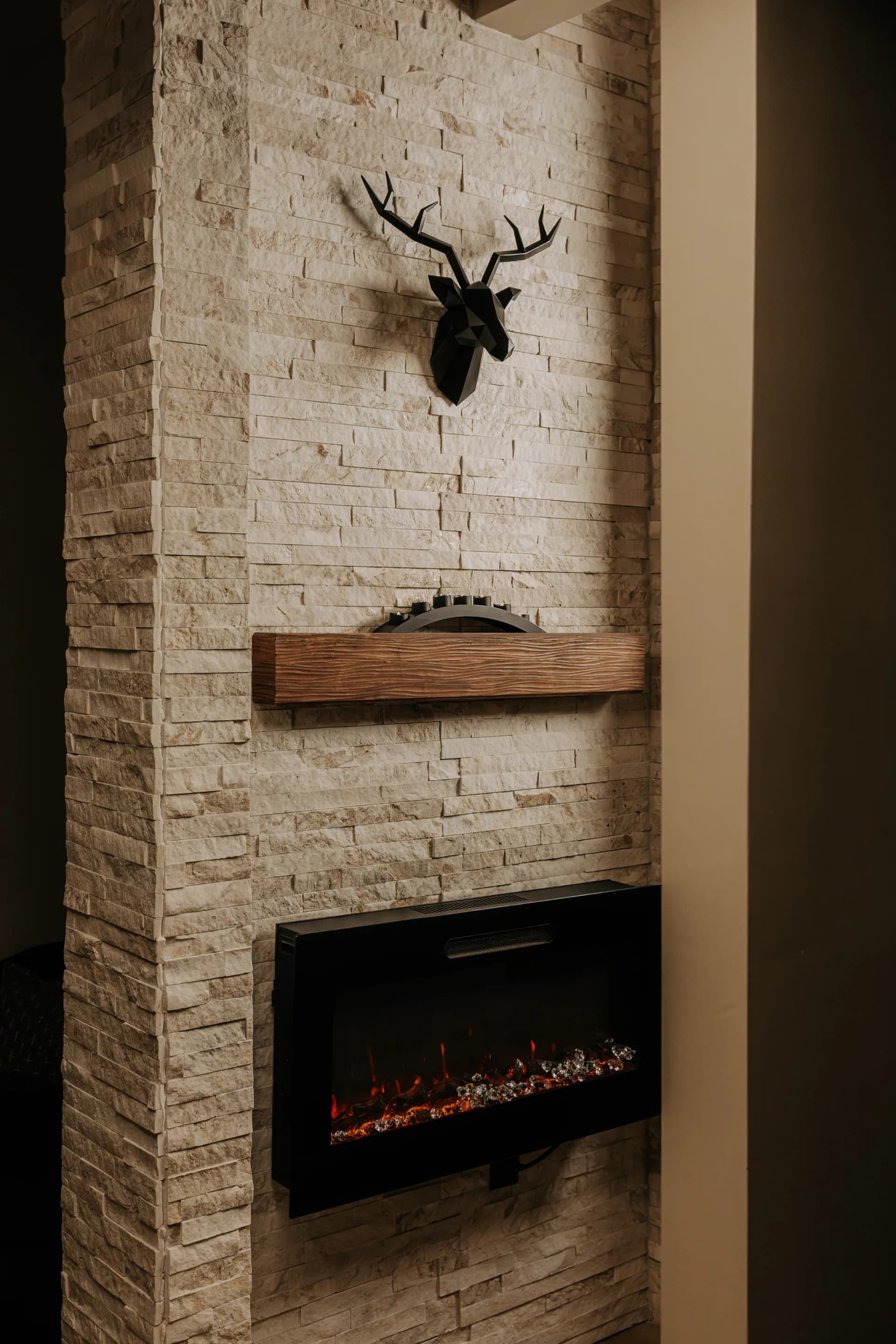 The fireplace and mantle in a Spavia Retreat Room