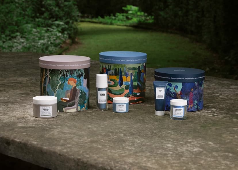 group-of-containers-on-a-stone-surface group of containers with skin care products on a stone surface